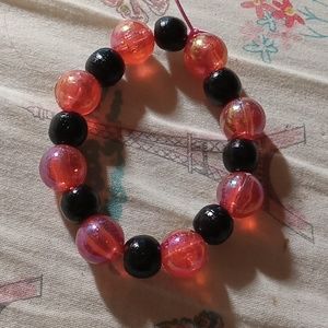 Black wood beads and red iridescent beads bracelet